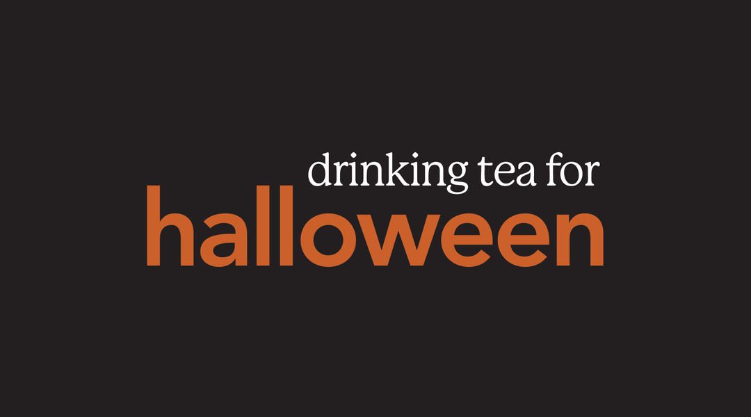 black graphic saying "drinking tea for halloween" in white and orange text.